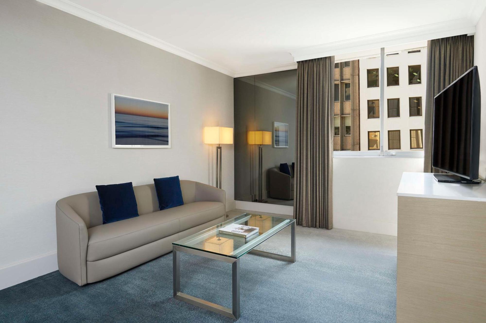 Hotel Parmelia Hilton Perth Exterior foto A living room in a typical apartment